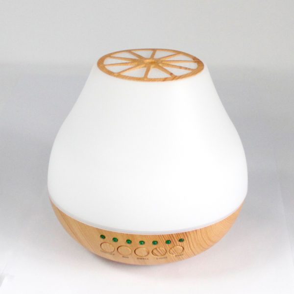 Viennese Atomiser with bluetooth speaker wooden base on a white background