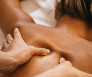 A person receiving a back massage 